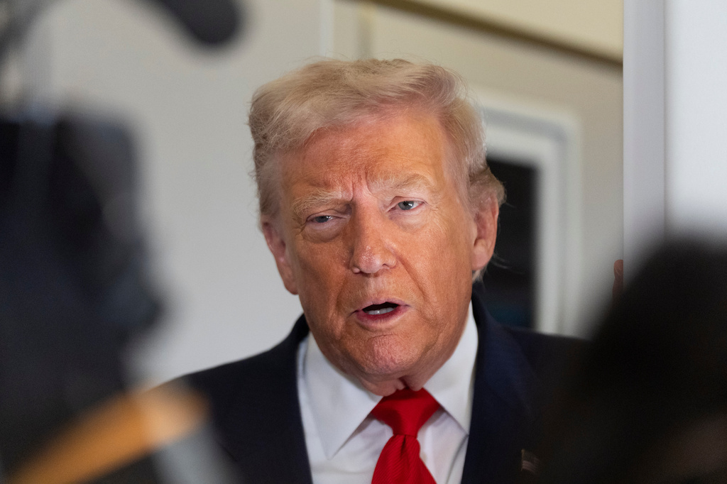 President Donald Trump speaks to the media after boarding Air Force One at Joint Base Andrews, Md., Friday, Oct. 31, 2025, enroute to Florida. AP Photo/Manuel Balce Ceneta)