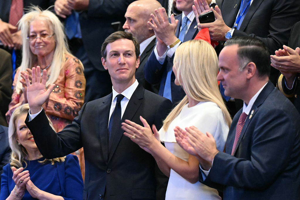 FILE - Jared Kushner with his wife, Ivanka Trump, acknowledges applause at the Israeli parliament, the Knesset, in Jerusalem, Oct. 13, 2025. (Saul Loeb/Pool via AP, File)