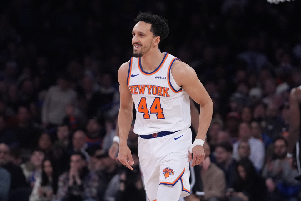 New York Knicks' Landry Shamet smiles after making a three-point shot during the second half of an NBA basketball game against the Brooklyn Nets Wednesday, Jan. 21, 2026, in New York. (AP Photo/Frank Franklin II)