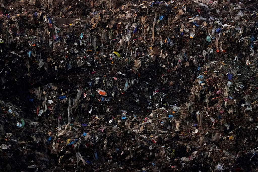 FILE - Shredded organic materials are piled up at a GreenWaste Renewable Energy Digestion Facility in San Jose, Calif., Oct. 27, 2023. (AP Photo/Jeff Chiu, File)