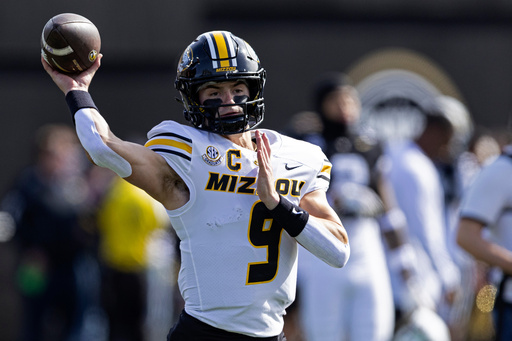 Missouri quarterback Beau Pribula (9) throws to a receiver during warmups before an NCAA college football game against Vanderbilt, Saturday, Oct. 25, 2025, in Nashville, Tenn. (AP Photo/Wade Payne) Missouri quarterback Beau Pribula (9) throws to a receiver during warmups before an NCAA college football game against Vanderbilt, Saturday, Oct. 25, 2025, in Nashville, Tenn. (AP Photo/Wade Payne)