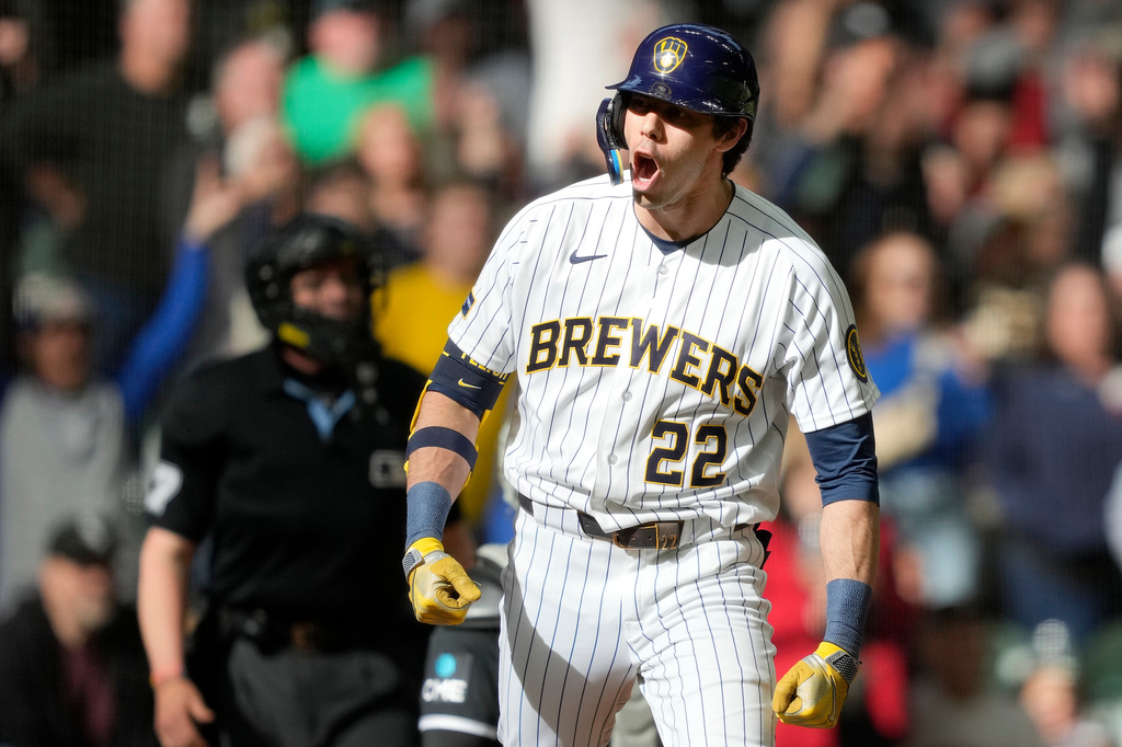 Milwaukee Brewers' Christian Yelich reacts to hitting a three-run home run during the eighth inning of a baseball game against the Chicago White Sox, Sunday, March 29, 2026, in Milwaukee. (AP Photo/Kayla Wolf)