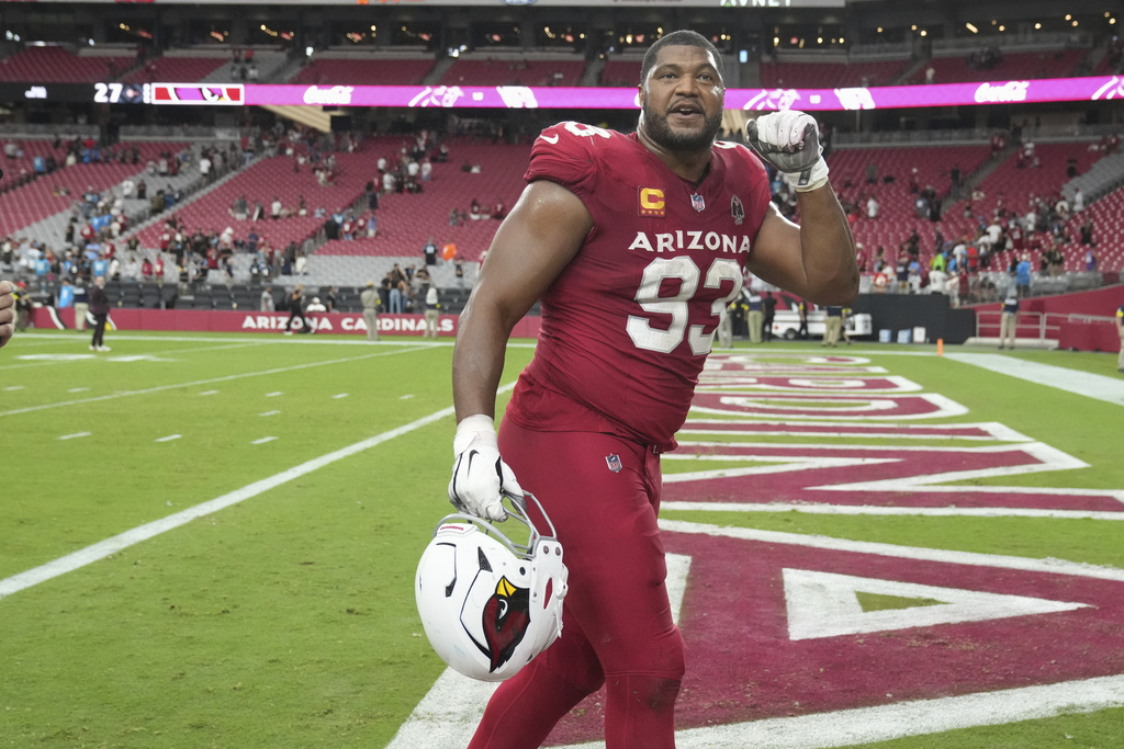 Arizona Cardinals defensive tackle Calais Campbell (93) leaves the field after an NFL football game against the Carolina Panthers, Sunday, Sept. 14, 2025, in Glendale, Ariz. (AP Photo/Rick Scuteri)