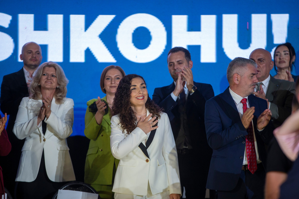Vjosa Osmani, Kosovo former president, greets supporters at the closing political rally of the Democratic League of Kosovo (LDK), in capital Pristina on Friday, June 5, 2026. (AP Photo/Visar Kryeziu)