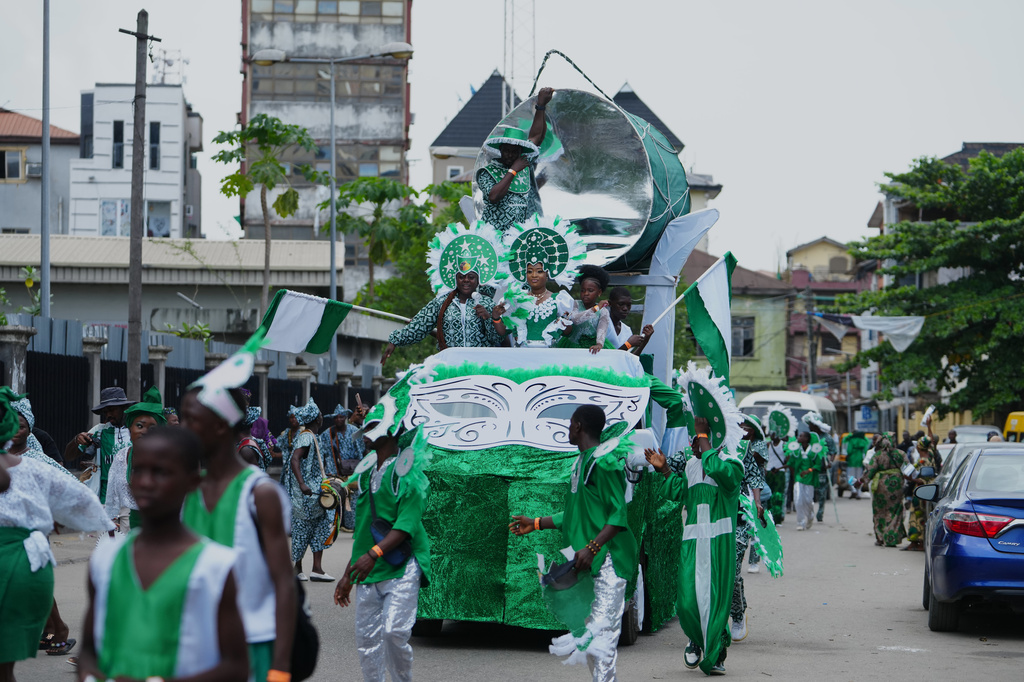 People dressed in costumes perform on the street during the Fanti Carnival in Lagos Nigeria, Monday, April 6, 2026, (AP Photo/Sunday Alamba)