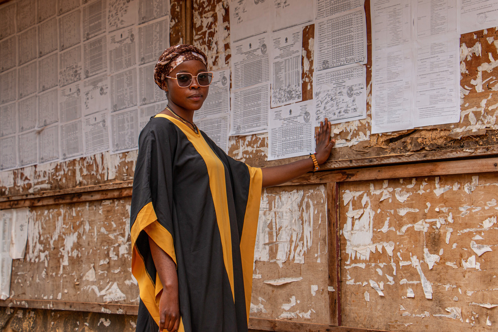 Tankeu Patie Merveille, 24, a student, poses on the campus of the University of Yaoundé I, Cameroon, Sept. 12, 2025 (AP Photo / Welba Yamo Pascal)