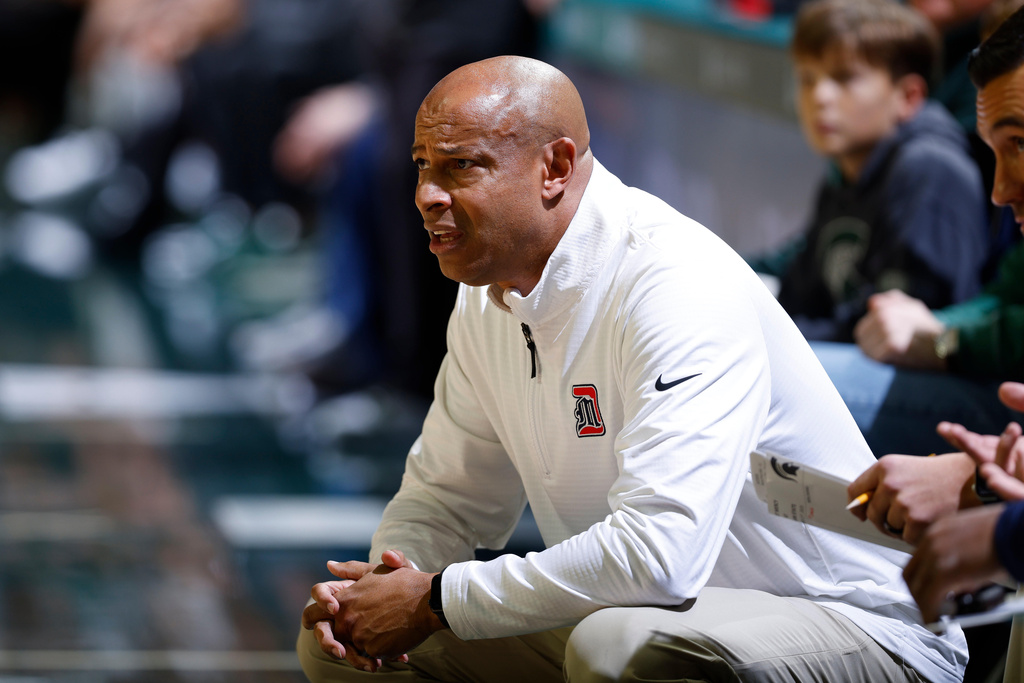 Detroit Mercy coach Mark Montgomery watches the first half of an NCAA college basketball game against Michigan State, Friday, Nov. 21, 2025, in East Lansing, Mich. (AP Photo/Al Goldis)