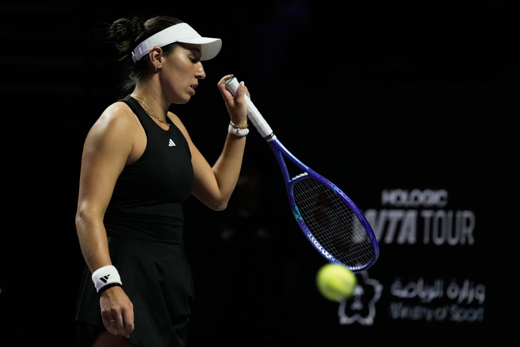 Jessica Pegula of the United States reacts during the women's singles semifinal match against Elena Rybakina of Kazakhstan at the WTA tennis finals in Riyadh, Saudi Arabia, Friday, Nov. 7, 2025. (AP Photo/Fatima Shbair)
