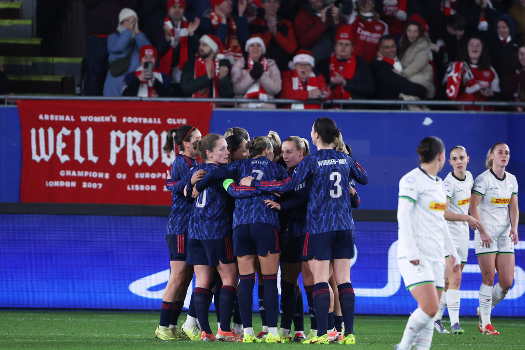 Arsenal players celebrate after Beth Mead scored their second goal during the women's Champions League opening phase soccer match between OH Leuven and Arsenal, in Leuven, Belgium, Wednesday, Dec. 17, 2025. (AP Photo/Omar Havana)