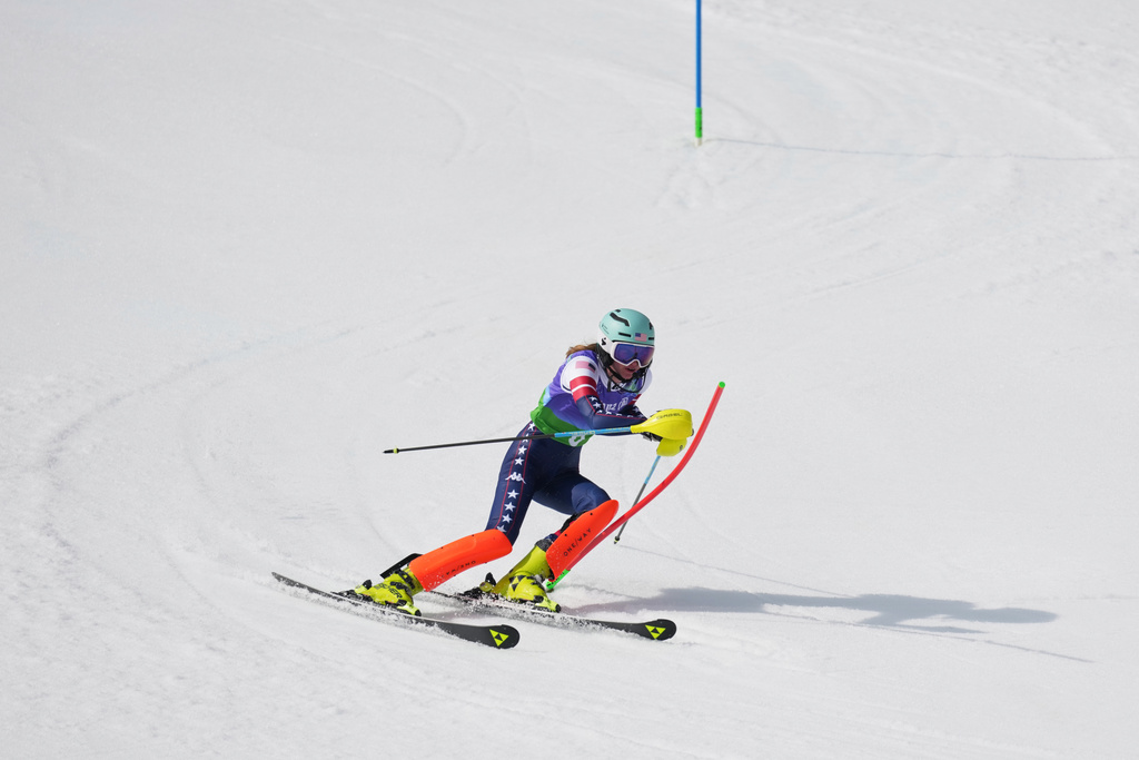 Meg Gustafson, of the United States, competes in the alpine skiing women's alpine combined VI slalom event at the 2026 Winter Paralympics, in Cortina d'Ampezzo, Italy, Tuesday, March 10, 2026. (AP Photo/Evgeniy Maloletka)