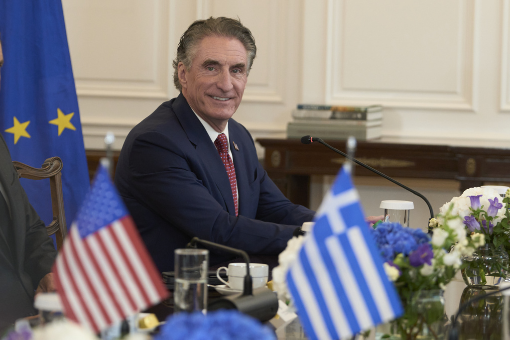 U.S. Secretary of the Interior Doug Burgum looks on during a meeting with Greek Prime Minister Kyriakos Mitsotakis at the Maximou Mansion in Athens, Thursday, Sept. 11, 2025. (AP Photo/Petros Giannakouris)