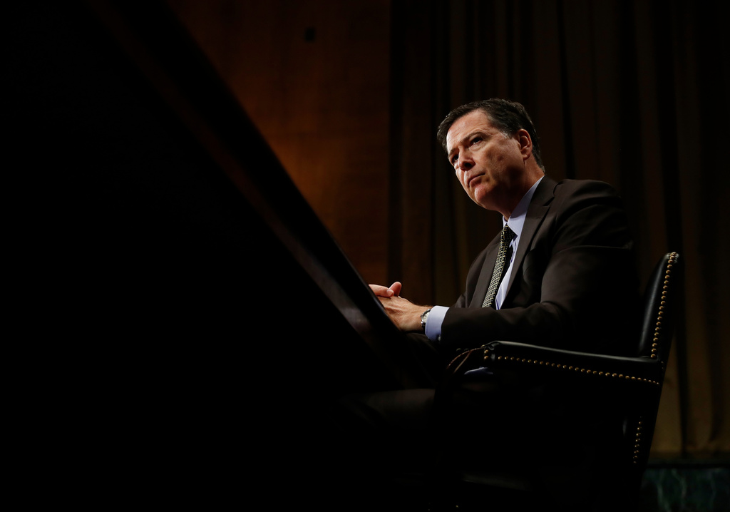 FILE - FBI Director James Comey pauses as he testifies on Capitol Hill in Washington, May 3, 2017, before the Senate Judiciary Committee hearing: "Oversight of the Federal Bureau of Investigation." (AP Photo/Carolyn Kaster, File)