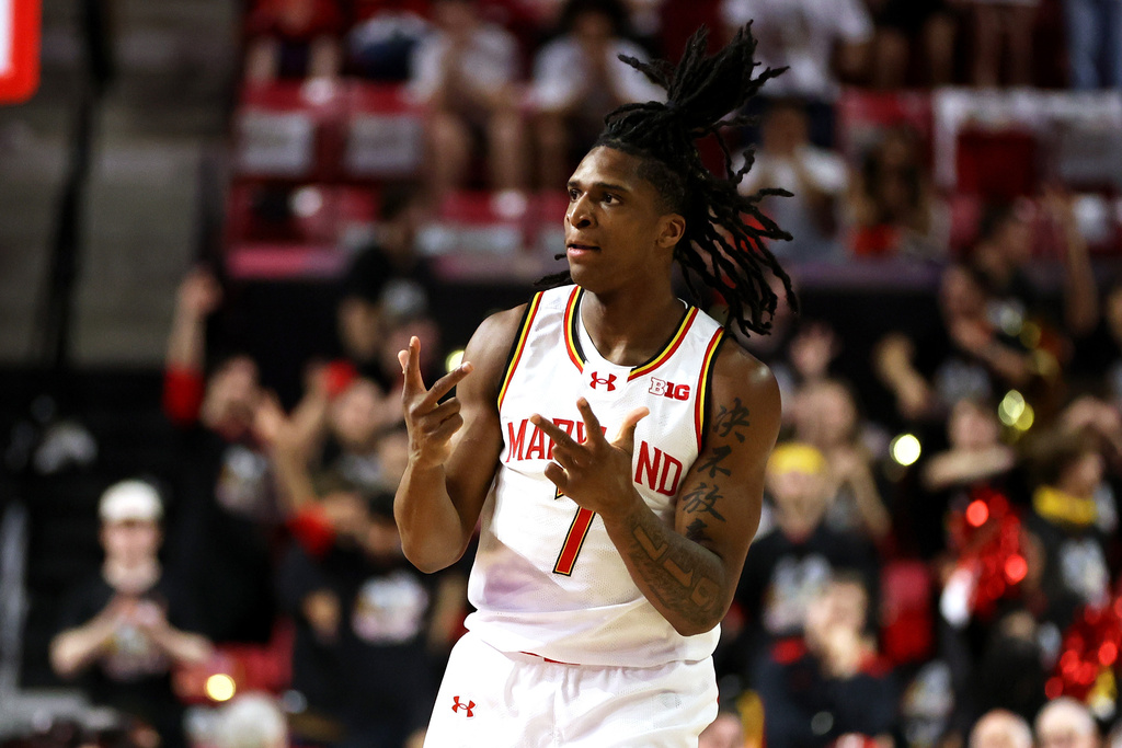 Maryland guard Andre Mills celebrates during the first half of an NCAA college basketball game against Illinois, Sunday, March 8, 2026, in College Park, Md. (AP Photo/Daniel Kucin Jr.)