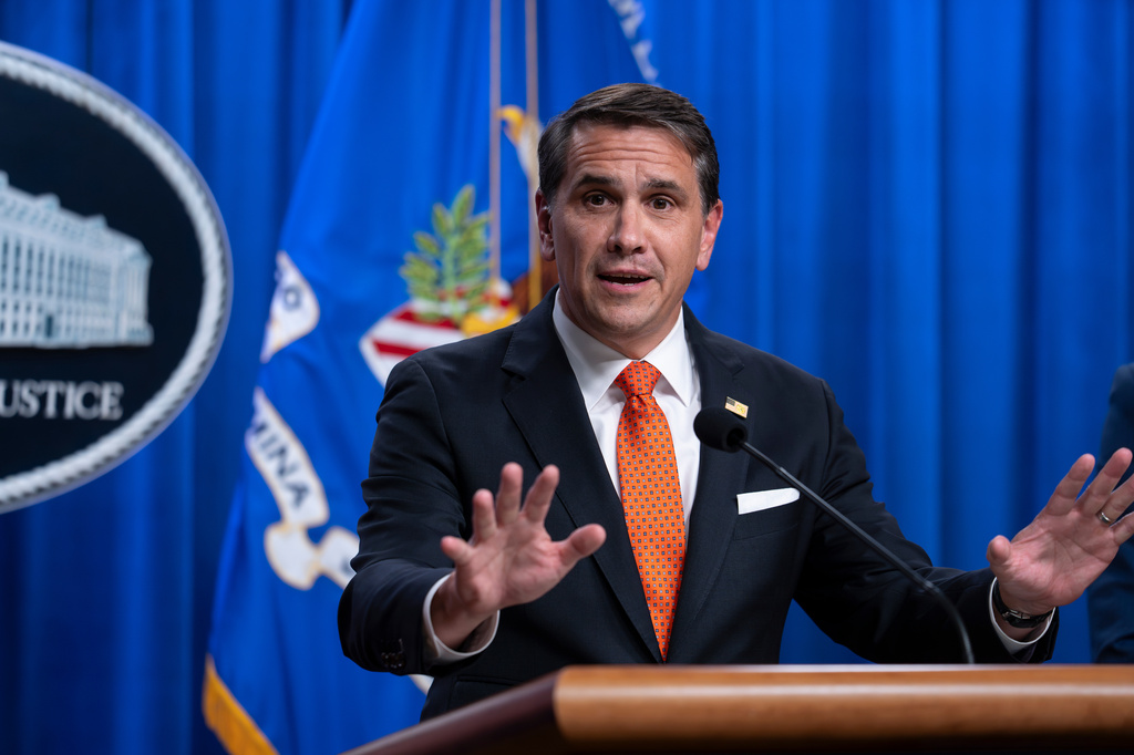 Acting Attorney General Todd Blanche speaks during a news conference regarding developments in the Trump Administration's anti-fraud efforts, at the Justice Department in Washington, Tuesday, April 7, 2026. (AP Photo/J. Scott Applewhite)
