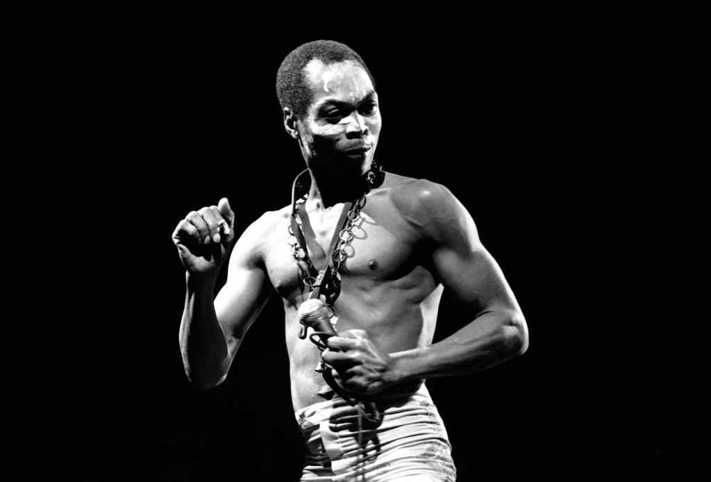 FILE - Nigerian musician and composer Fela Anikulapo Kuti performs at the "Party of Humankind" of the French Communist Party at La Courneuve in Paris, France. Saturday, Sept. 13, 1986. (AP Photo/Laurent Rebours, File)