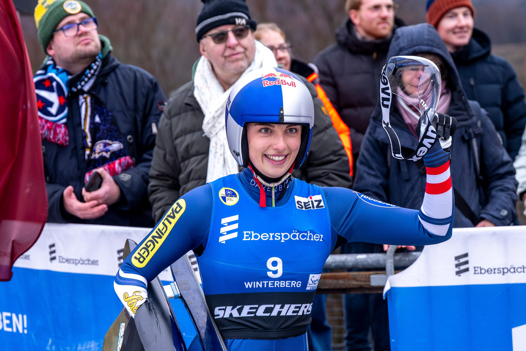 First placed Austria's Hannah Prock reacts after the women's single-seater Luge World Cup race in Winterberg, Germany, Sunday, Dec. 7, 2025. (David Inderlied/dpa via AP)