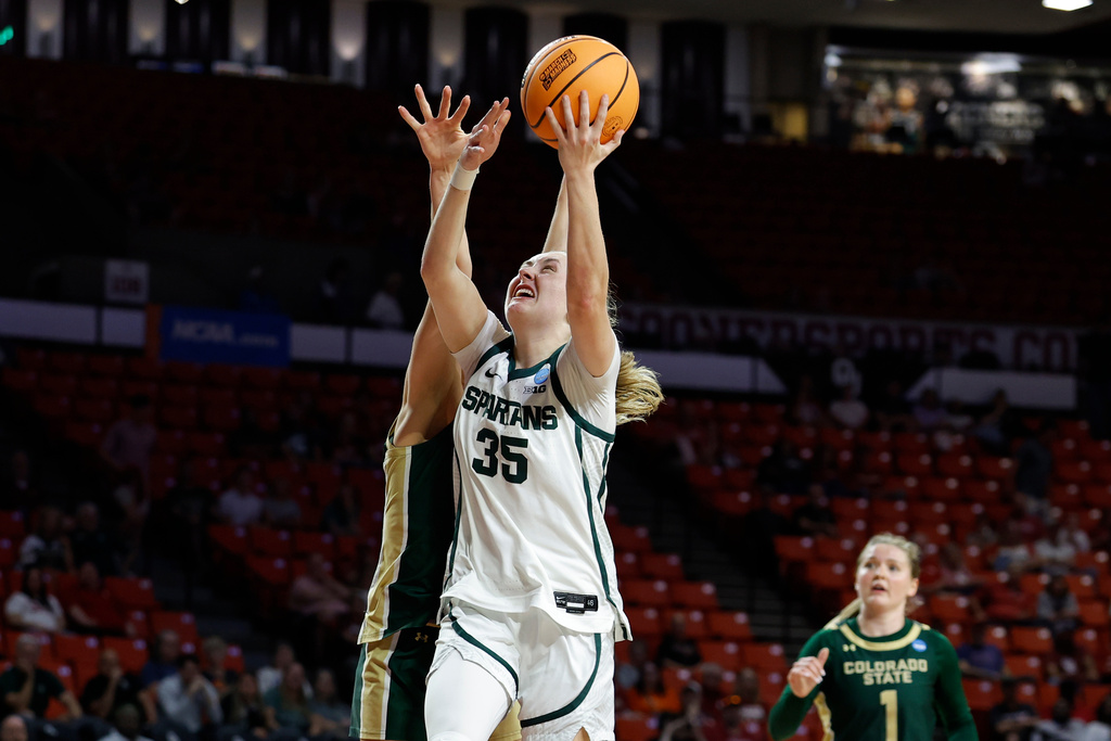 Michigan State guard Kennedy Blair (35) goes up for a basket against Colorado State during the first half in the first round of the NCAA college basketball tournament Friday, March 20, 2026, Norman, Okla. (AP Photo/Alonzo Adams)