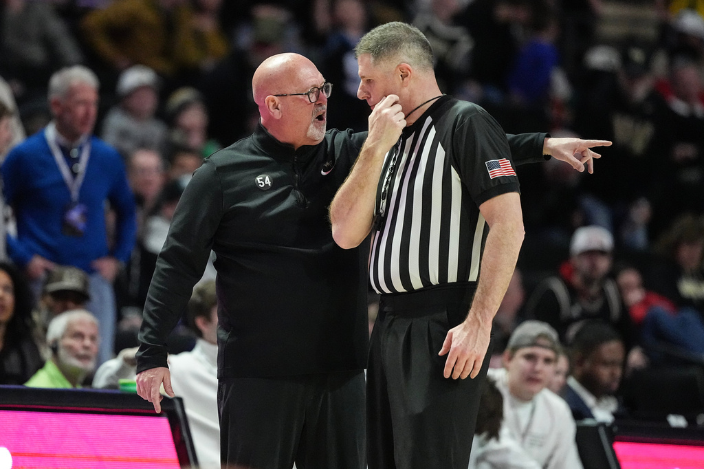 FILE - Wake Forest head coach Steve Forbes speaks to referee Tony Henderson during the second half of an NCAA college basketball game against Louisville, Feb. 7, 2026, in Winston-Salem, N.C. (AP Photo/Matt Kelley, File)