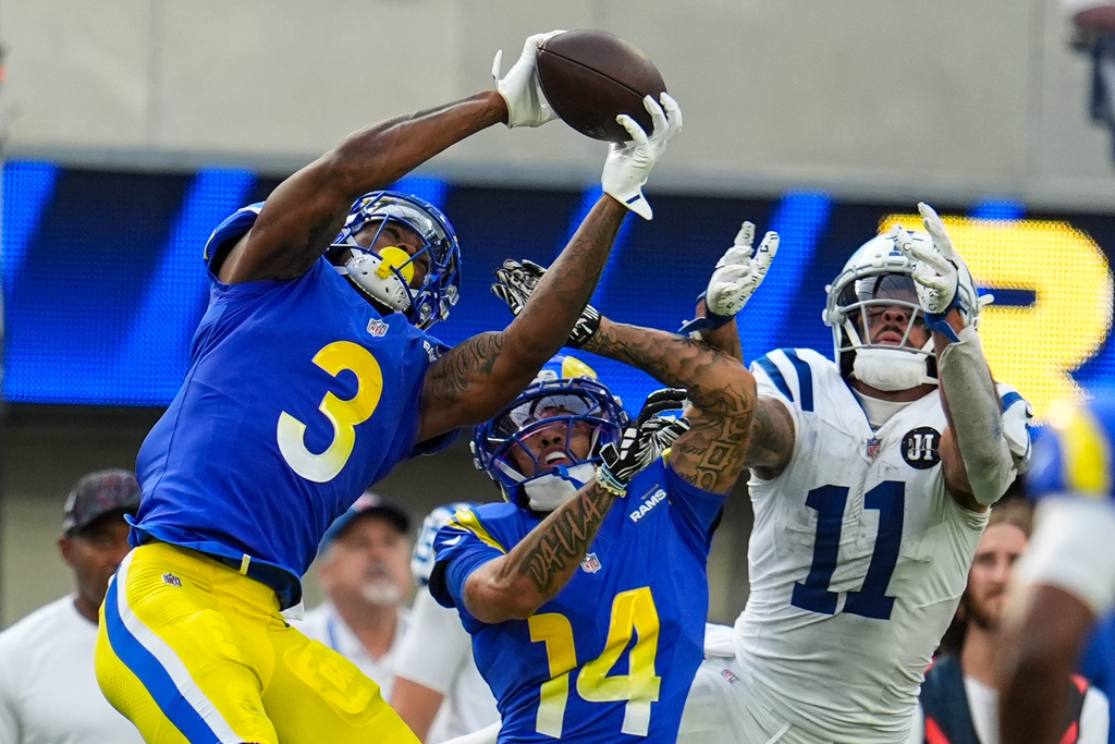 Los Angeles Rams safety Kam Curl (3) intercepts a pass intended for Indianapolis Colts wide receiver Michael Pittman (11) during the second hall of an NFL football game Sunday, Sept. 28, 2025, in Inglewood, Calif. (AP Photo/Marcio Jose Sanchez)