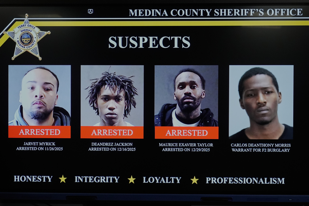 The Medina County Sheriff's Office displays mugshots of four suspects in connection with the Nov. 16 burglary at the home of Cleveland Browns quarterback Shedeur Sanders, Thursday, Jan. 8, 2026, in Medina, Ohio. (AP Photo/Sue Ogrocki)