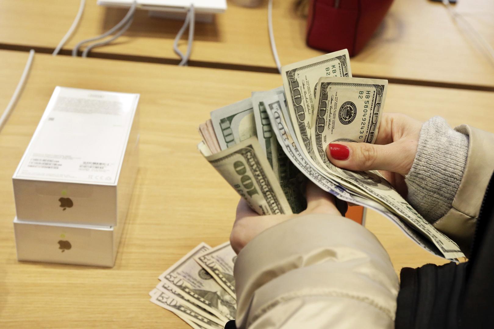 New tariff threats aimed at Apple, Europe send markets tumbling, an AP business editor explains. (AP video by Mike Householder)
