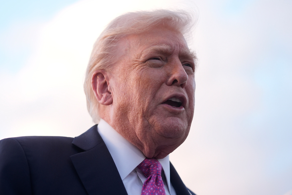 President Donald Trump speaks to reporters after arriving on Air Force One, Friday, Oct. 17, 2025, at Palm Beach International Airport in West Palm Beach, Fla. (AP Photo/Mark Schiefelbein)