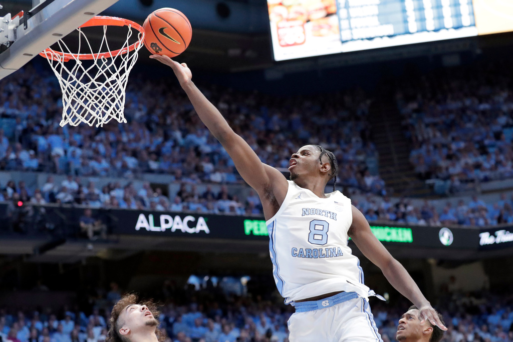 North Carolina forward Caleb Wilson drives to the basket during the first half of an NCAA college basketball game against Wake Forest, Saturday, Jan. 10, 2026, in Chapel Hill, N.C. (AP Photo/Chris Seward)