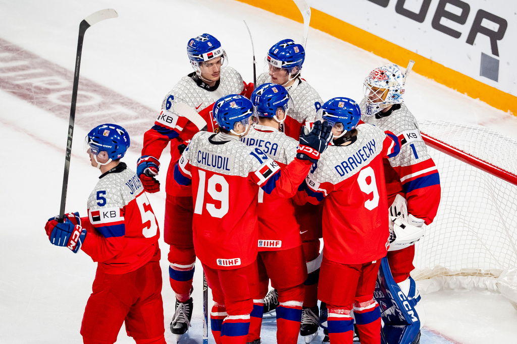 Team Czechia celebrates after defeating Latvia in IIHF World Junior Championship hockey action in Minneapolis on Wednesday, Dec. 31, 2025. (Christopher Katsarov/The Canadian Press via AP)