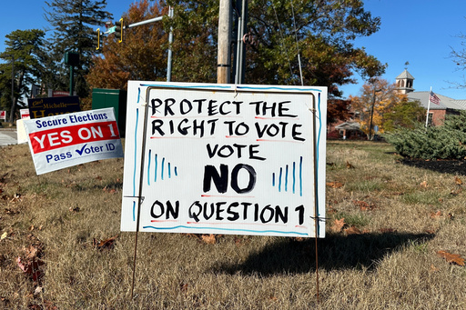 Signs supporting and opposing a voter identification referendum in the state are shown Thursday, Oct. 23, 2025, in Scarborough, Maine. (AP Photo/Patrick Whittle) Signs supporting and opposing a voter identification referendum in the state are shown Thursday, Oct. 23, 2025, in Scarborough, Maine. (AP Photo/Patrick Whittle)
