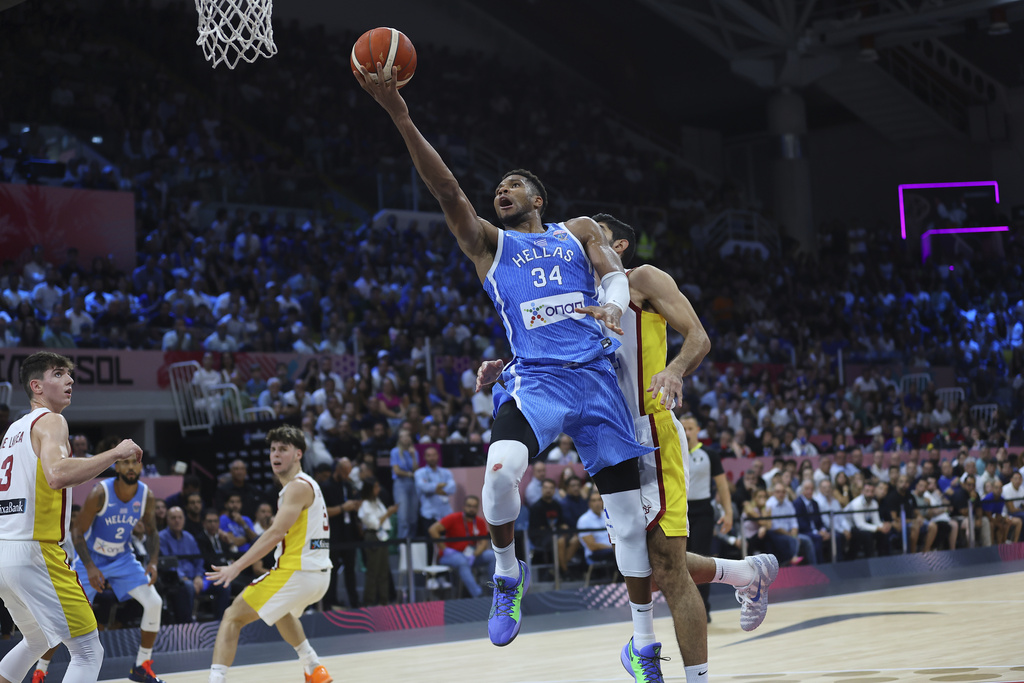 Greece's Giannis Antetokounmpo drives the ball during the Eurobasket, European Basketball Championship Group C match between Spain and Greece at Spyros Kyprianou Arena, in Limassol, Cyprus, Thursday, Sept. 4, 2025. (AP Photo/Sakis Savvides)