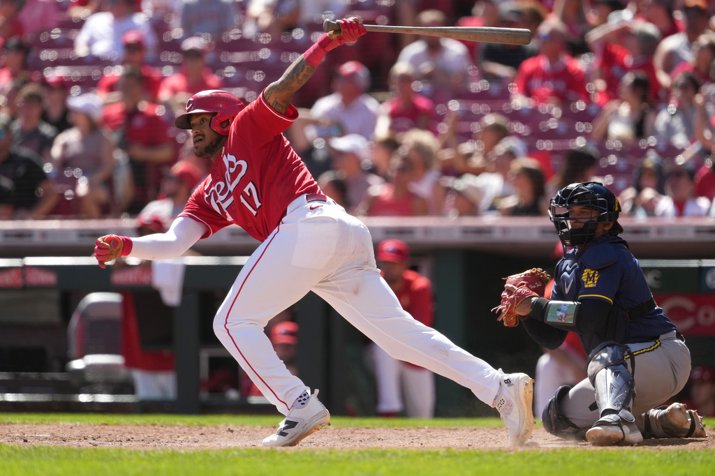 Cincinnati Reds' Dane Myers grounds into a fielder's choice that scored two runs in the eighth inning of a baseball game against the Milwaukee Brewers, Sunday, Sept. 6, 2026, in Cincinnati. (AP Photo/Kareem Elgazzar)