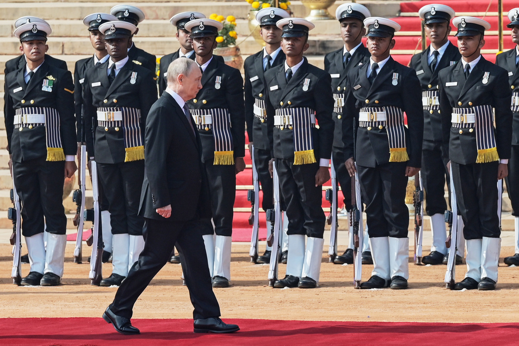 Russian President Vladimir Putin receives a guard of honor during a ceremonial reception at the Rashtrapati Bhavan in New Delhi, India, Friday, Dec. 5, 2025. (AP Photo)