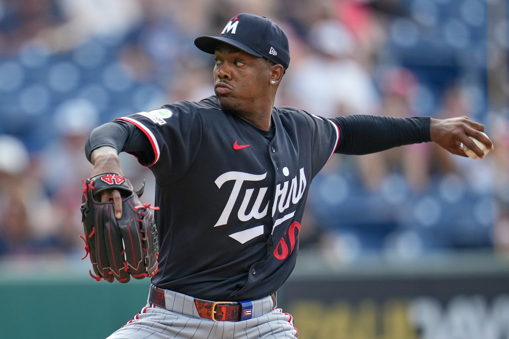 Minnesota Twins' Kendry Rojas pitches in the first inning of a baseball game against the Cleveland Guardians in Cleveland, Tuesday, July 21, 2026. (AP Photo/Sue Ogrocki)