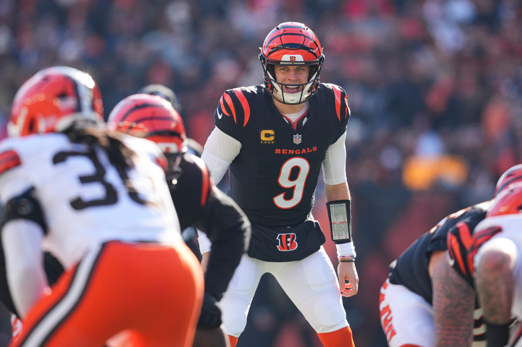 FILE - Cincinnati Bengals quarterback Joe Burrow (9) looks on during an NFL football game against the Cleveland Browns, Jan. 4, 2026, in Cincinnati. (AP Photo/Jeff Dean, File)