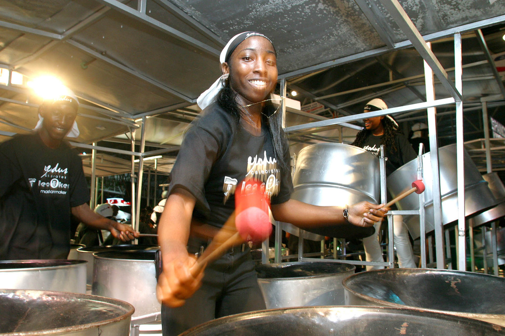 FILE -A steelpan player performs during the National Panorama 2004 band competition Feb. 8, 2004 at the Queen's Park in Port of Spain, Trinidad. (AP Photo/ Shirley Bahadur, File)