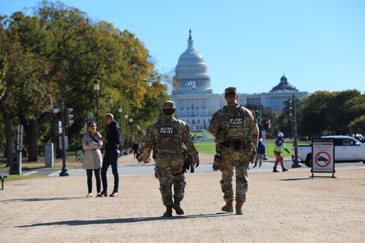 National Guard soldiers patrol on the National Mall near the U.S. Capitol, Friday, Oct. 17, 2025, in Washington. (AP Photo/Rahmat Gul) National Guard soldiers patrol on the National Mall near the U.S. Capitol, Friday, Oct. 17, 2025, in Washington. (AP Photo/Rahmat Gul)