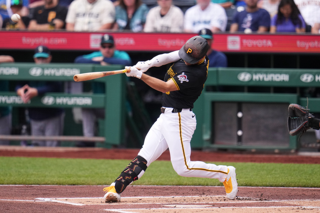 Pittsburgh Pirates' Brandon Lowe hits a solo home run off Seattle Mariners pitcher Bryce Miller during the first inning of a baseball game in Pittsburgh, Thursday, June 25, 2026. (AP Photo/Gene J. Puskar)