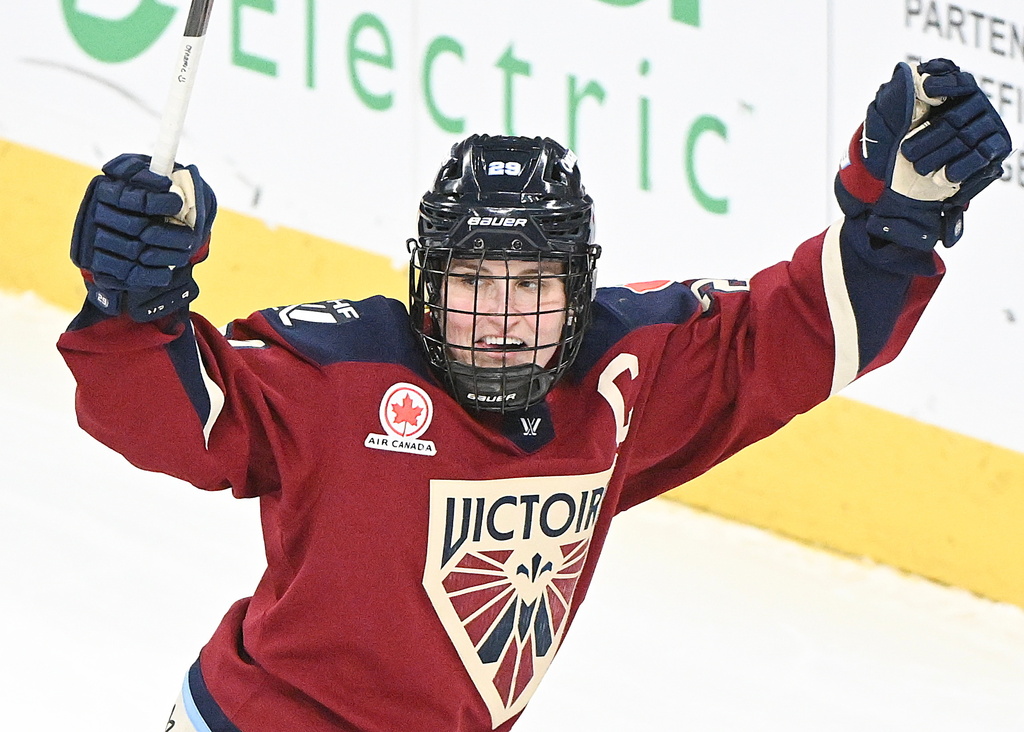 Montreal Victoire's Marie-Philip Poulin (29) reacts after scoring against the Toronto Sceptres during the second period of an PWHL hockey game in Laval, Quebec, Wednesday, Jan. 28, 2026. (Graham Hughes/The Canadian Press via AP)