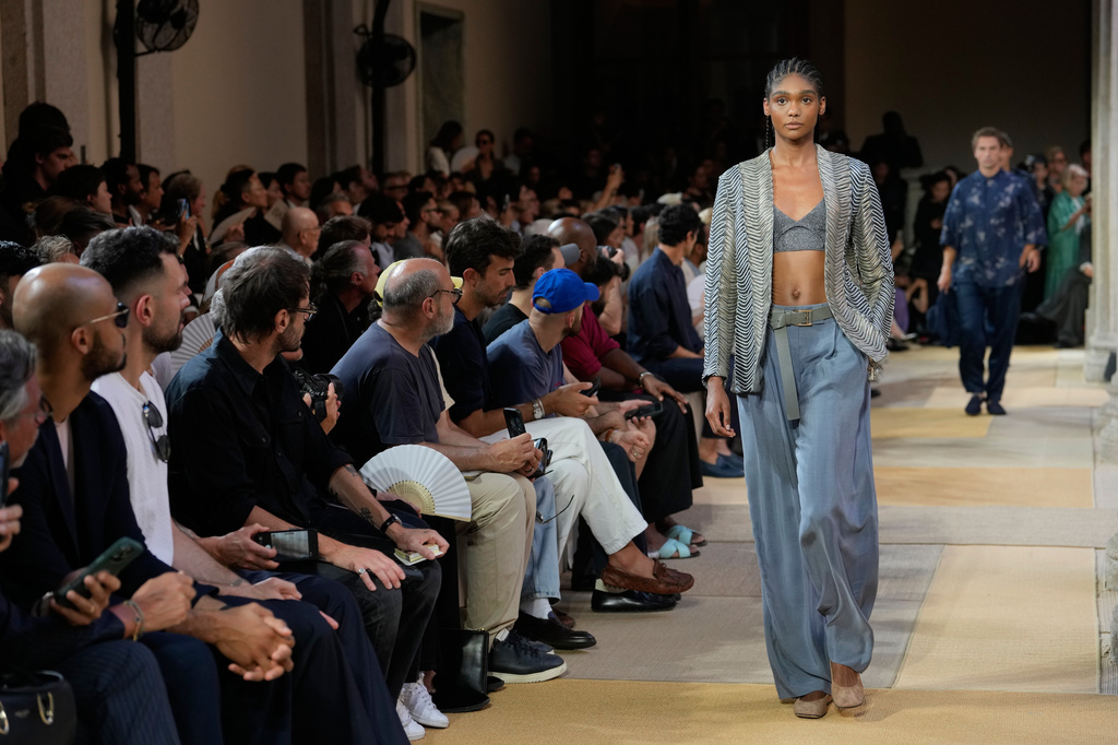 A model wears a creation as part of the Giorgio Armani Spring/Summer 2027 men's collection presented in Milan, Italy, Monday, June 22, 2026. (AP Photo/Luca Bruno)