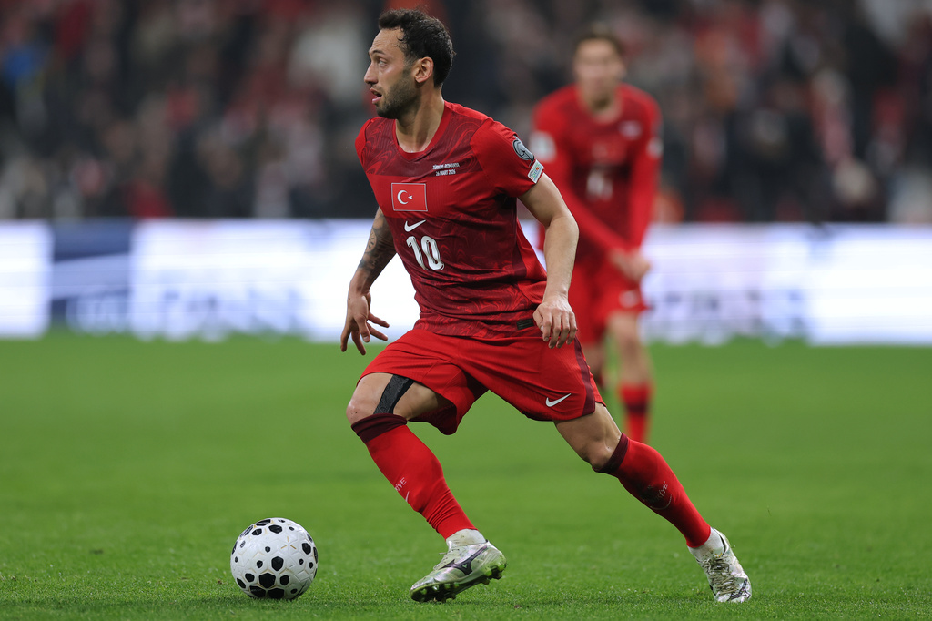 FILE - Turkey's Hakan Calhanoglu controls the ball during the 2026 World Cup playoff semifinal soccer match between Turkey and Romania, in Istanbul, Turkey, Thursday, March 26, 2026. (AP Photo, File)