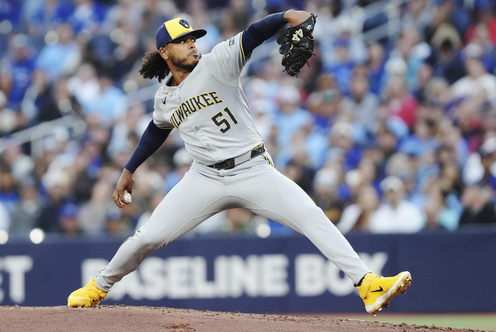 Milwaukee Brewers pitcher Freddy Peralta (51) works against the Toronto Blue Jays during first inning MLB baseball action in Toronto on Friday, August 29, 2025. (Chris Young/The Canadian Press via AP)