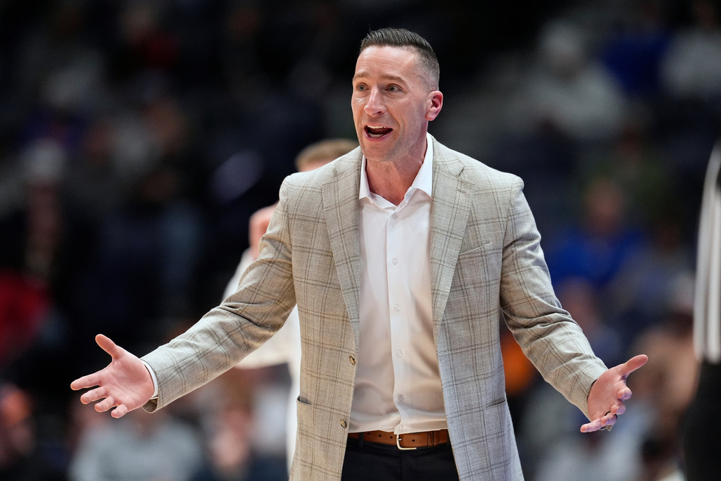 Auburn head coach Steven Pearl reacts to a play during the first half of an NCAA college basketball game against Tennessee in the second round of the Southeastern Conference tournament Thursday, March 12, 2026, in Nashville, Tenn. (AP Photo/George Walker IV)