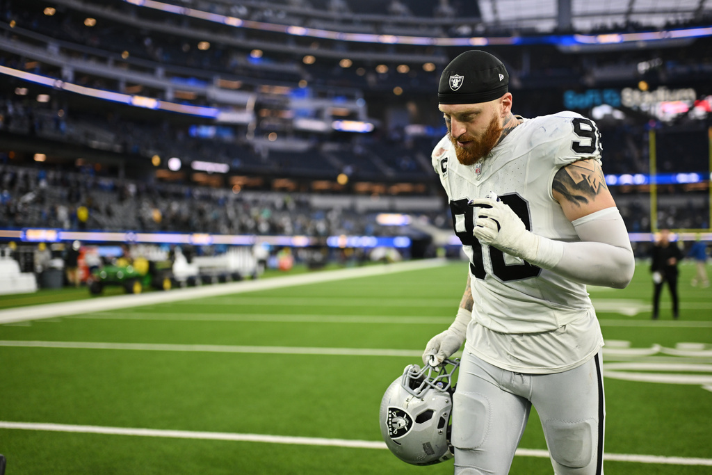 Las Vegas Raiders defensive end Maxx Crosby jogs off the field after an NFL football game against the Los Angeles Chargers, Sunday, Nov. 30, 2025, in Inglewood, Calif. (AP Photo/William Liang)
