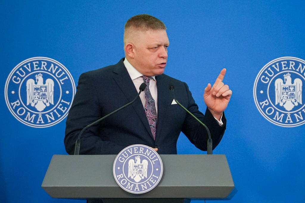 Slovakia's Prime Minister Robert Fico gestures during joint statements with Romanian counterpart Ilie Bolojan, at the Victoria Palace, the Romanian government headquarters in Bucharest, Romania, Friday, March 27, 2026. (AP Photo/ Vadim Ghirda)