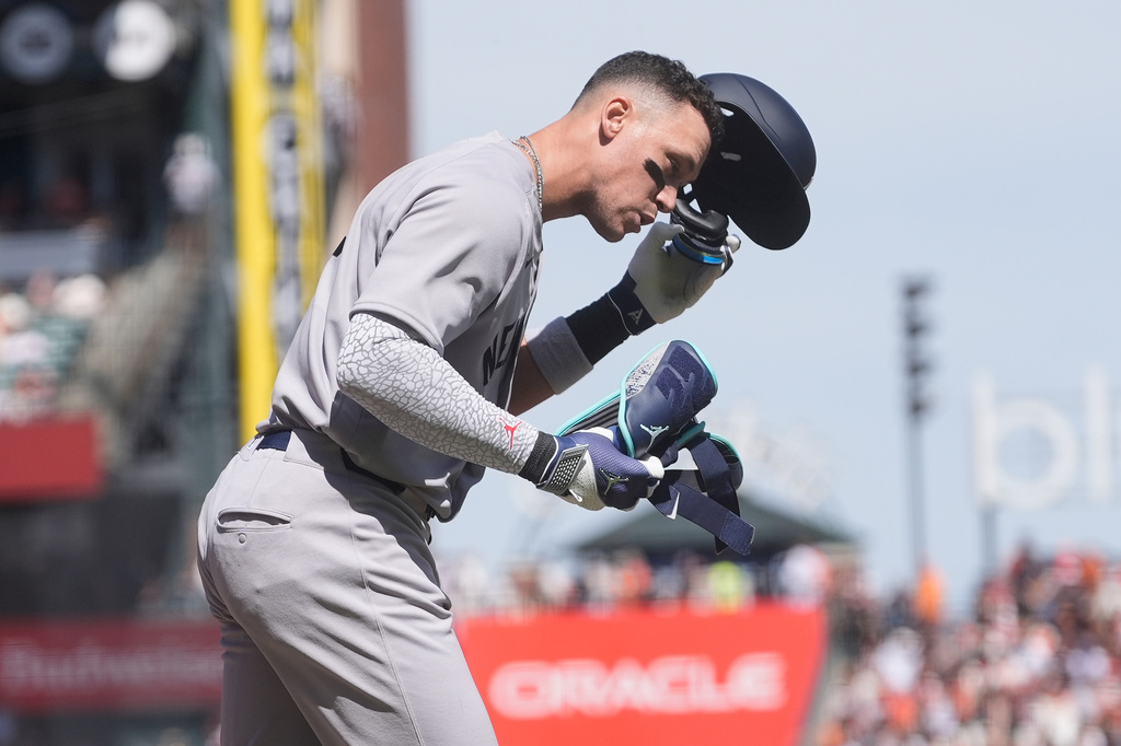 New York Yankees' Aaron Judge reacts after striking out during the third inning of a baseball game against the San Francisco Giants in San Francisco, Friday, March 27, 2026. (AP Photo/Jeff Chiu)