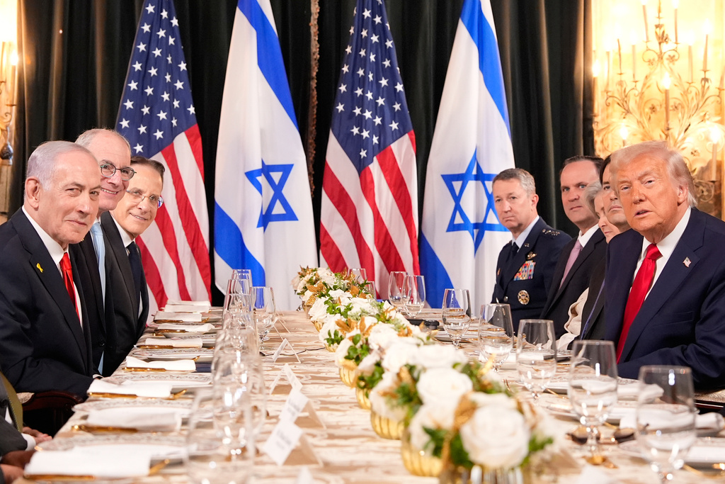 President Donald Trump and Israel's Prime Minister Benjamin Netanyahu are seated before a luncheon at his Mar-a-Lago club, Monday, Dec. 29, 2025, in Palm Beach, Fla. (AP Photo/Alex Brandon)