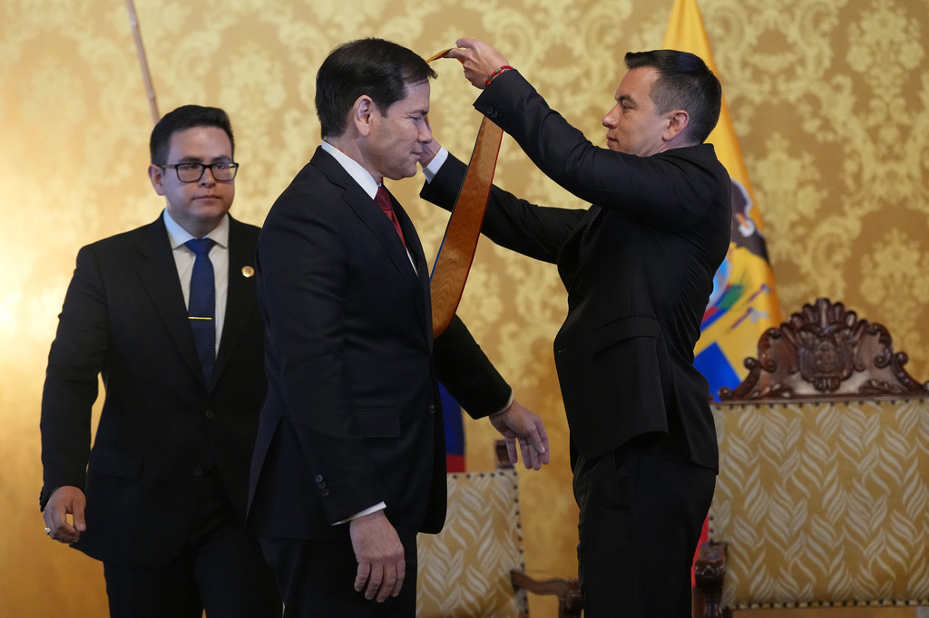 Ecuador's President Daniel Noboa, right, presents U.S. Sec. of State Marco Rubio with Ecuador's highest-ranking National Order of Merit, the Grand Cross, at Carondelet palace in Quito, Ecuador, Wednesday, Sept. 9, 2026. (AP Photo/Dolores Ochoa, Pool)