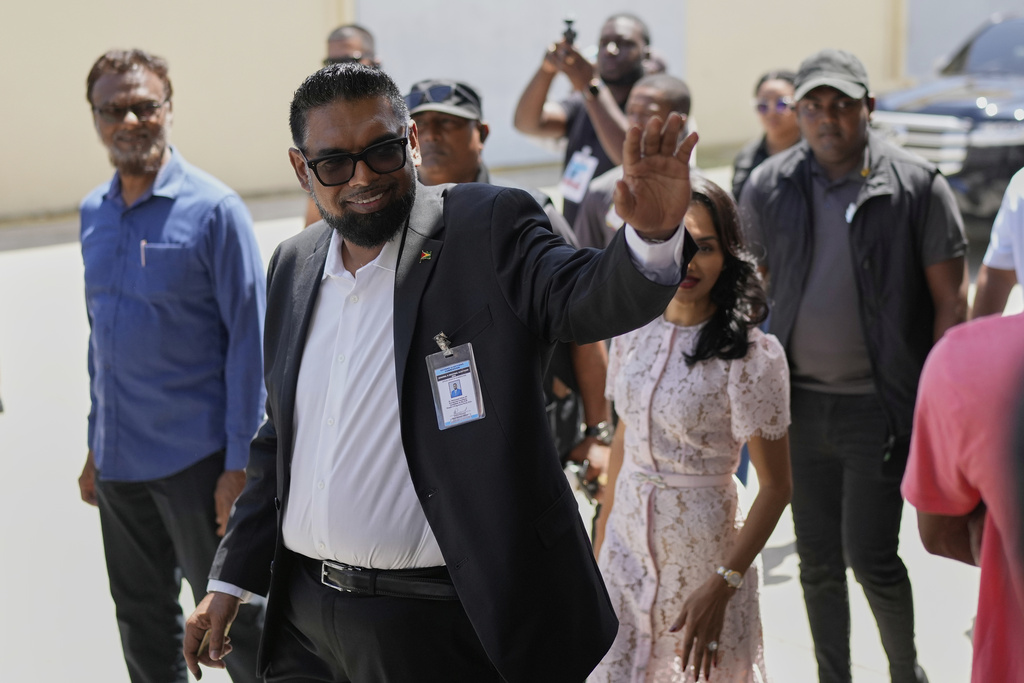 President Irfaan Ali, who is running for re-election, waves after voting during general elections in Leonora, Guyana, Monday, Sept. 1, 2025.(AP Photo/Matias Delacroix)