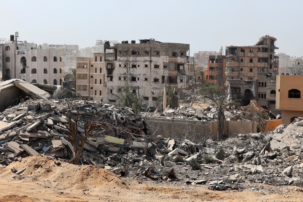 This picture taken during a media tour organised by the Israeli army shows war-damaged and destroyed buildings in the vicinity of the Jordanian Field Hospital in Gaza City, Friday, Oct. 3, 2025. (Jack Guez/Pool Photo via AP)