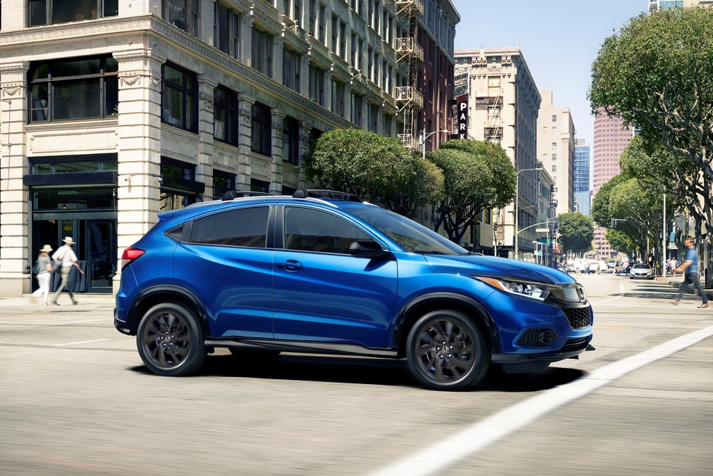 \This photo provided by Honda shows the 2022 HR-V. The HR-V won't stand out in a parking lot, but it is undeniably practical for an extra-small SUV. (Courtesy of American Honda Motor Co. via AP)